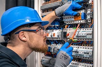 Electrician Conducting Electrical Repair Services